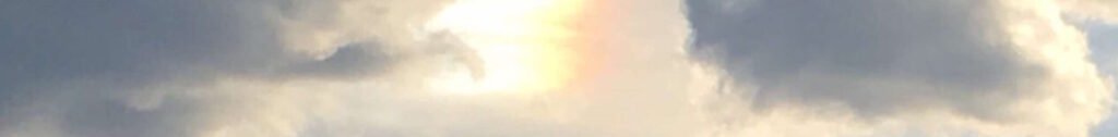 Sun through dark clouds
